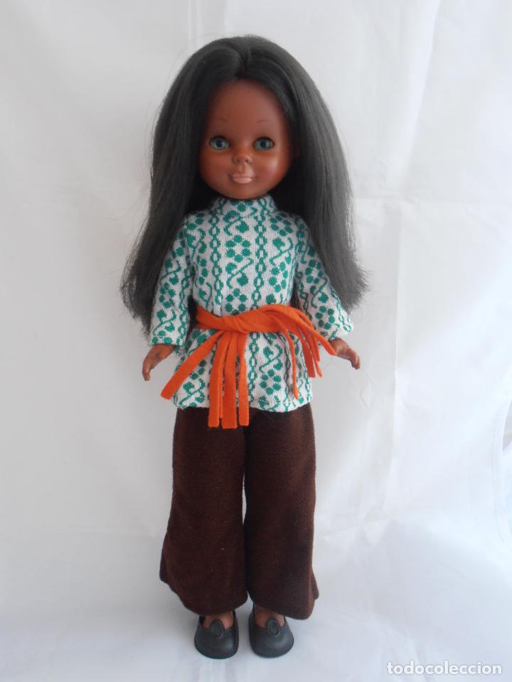 Nancy Negrita con conjunto verde loco loco